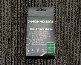 High Voltage Tech. Rapid Travel Charger #HV-CH-906 for a (Olympus Li-40, Li-42, Nikon EN-EL10, Fuji NP-45 Batteries) AC100/240Volt